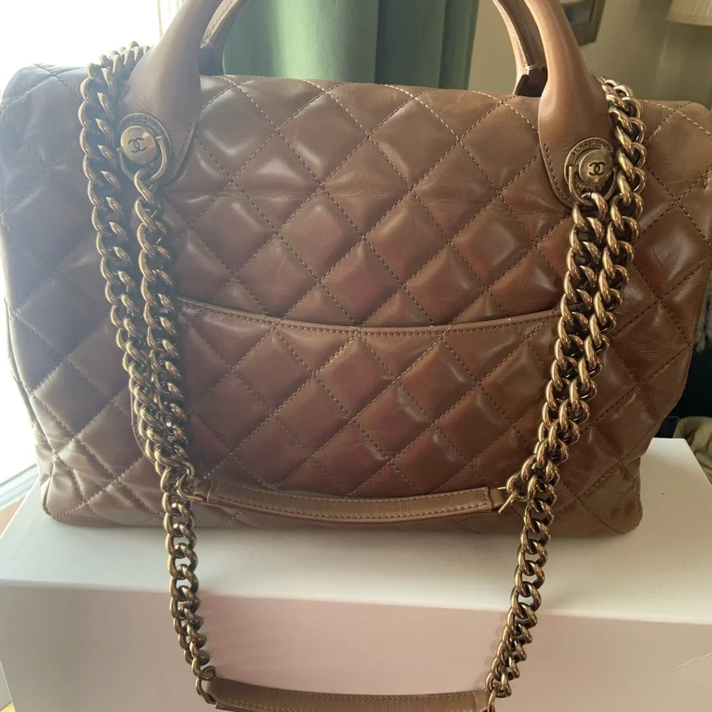 Classic brown lamb‎ skin Chanel handbag with shoulder strap
